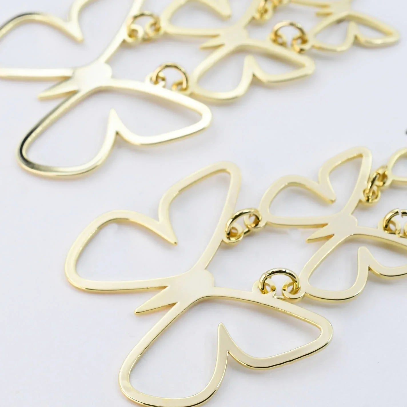 Butterfly Bliss: Gold Butterfly Dangle Earrings - Bella Blossom Boutique