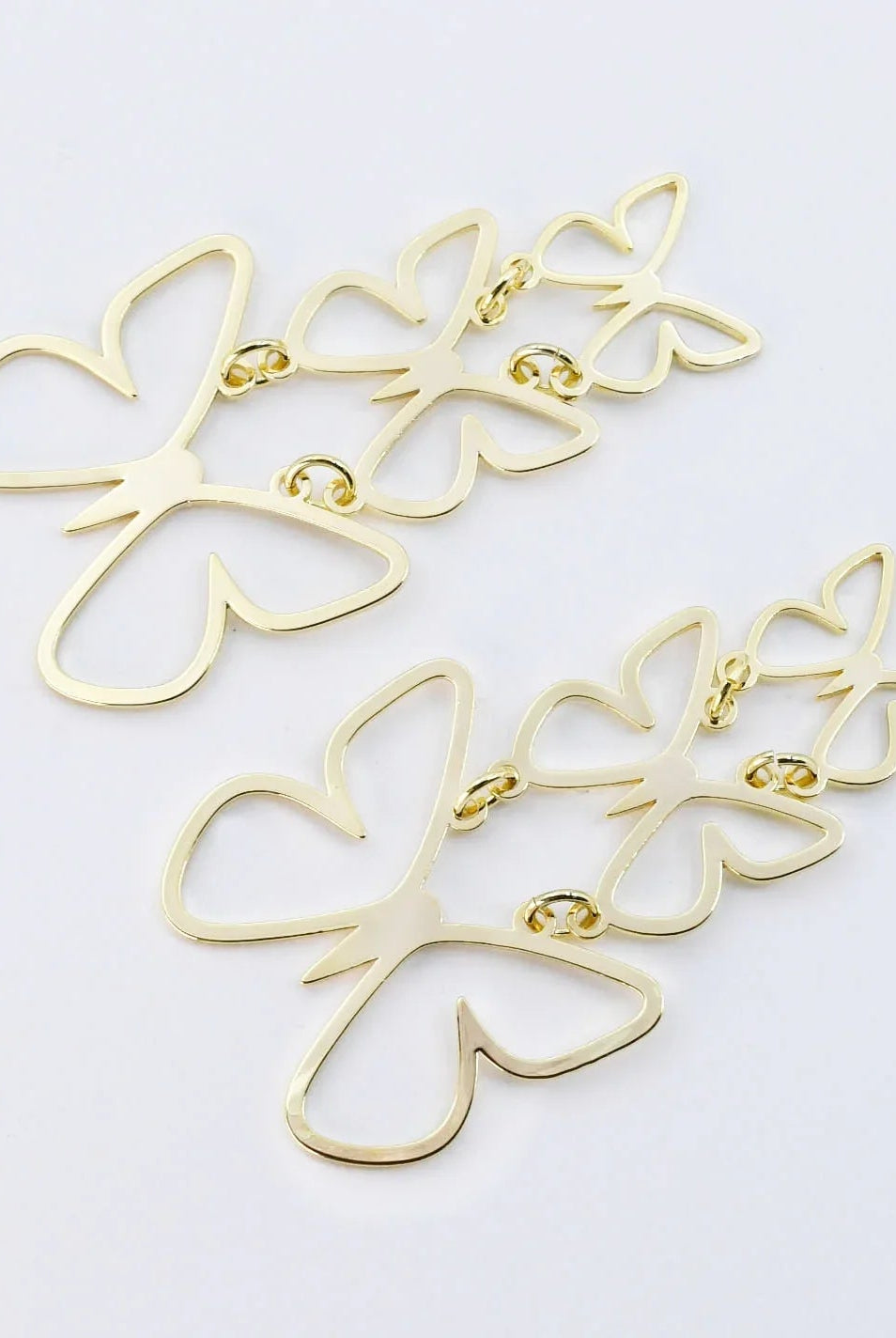 Butterfly Bliss: Gold Butterfly Dangle Earrings - Bella Blossom Boutique