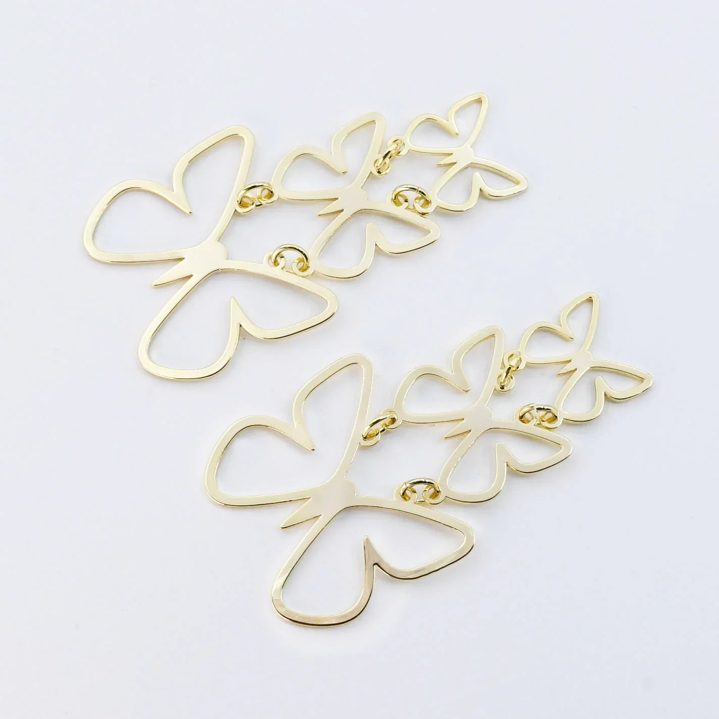 Butterfly Bliss: Gold Butterfly Dangle Earrings - Bella Blossom Boutique