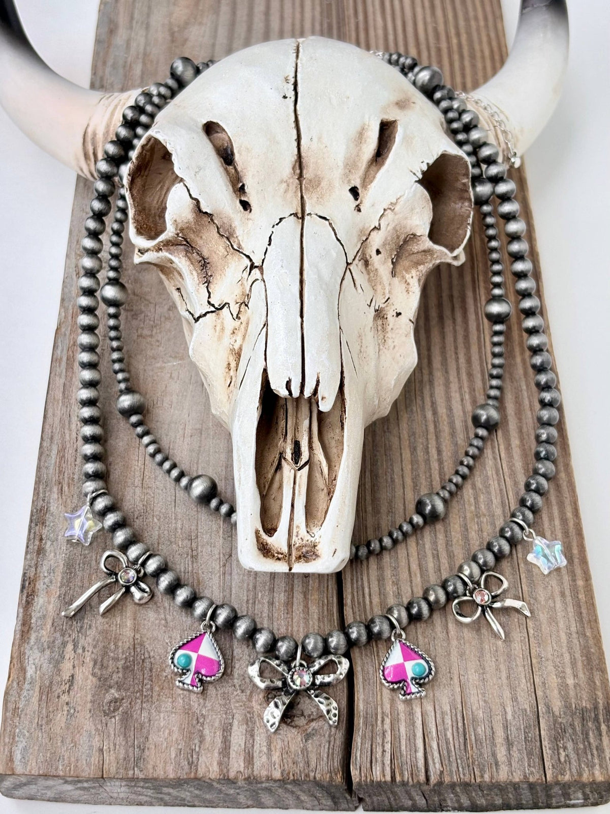 Layered Pearl Necklace with Bow & Spade Charms - Bella Blossom Boutique