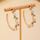 Botanical Bloom: White Enamel & Crystal Gold Hoop Earrings - Bella Blossom Boutique