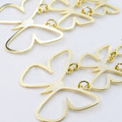 Butterfly Bliss: Gold Butterfly Dangle Earrings - Bella Blossom Boutique