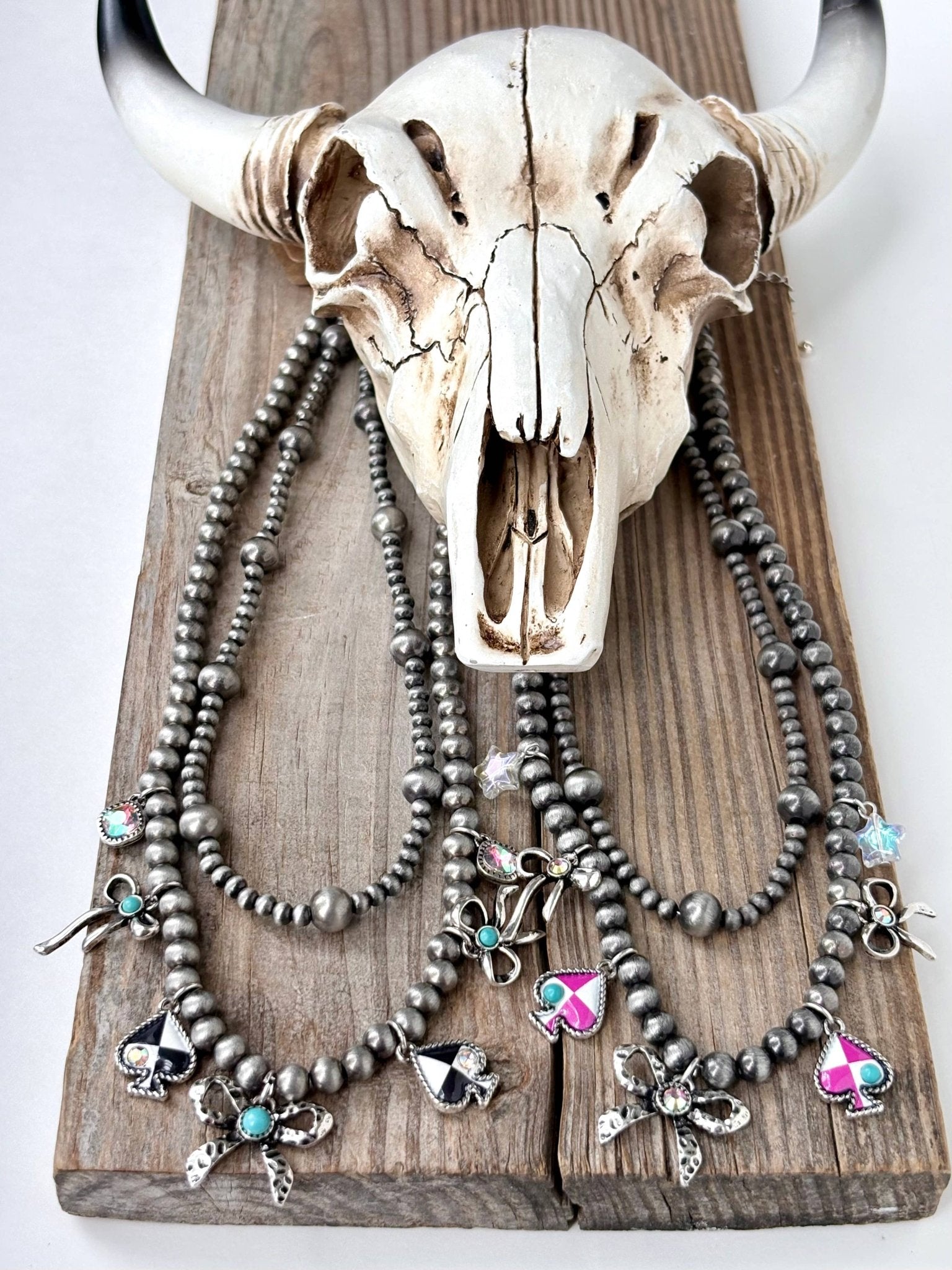 Layered Pearl Necklace with Bow & Spade Charms - Bella Blossom Boutique