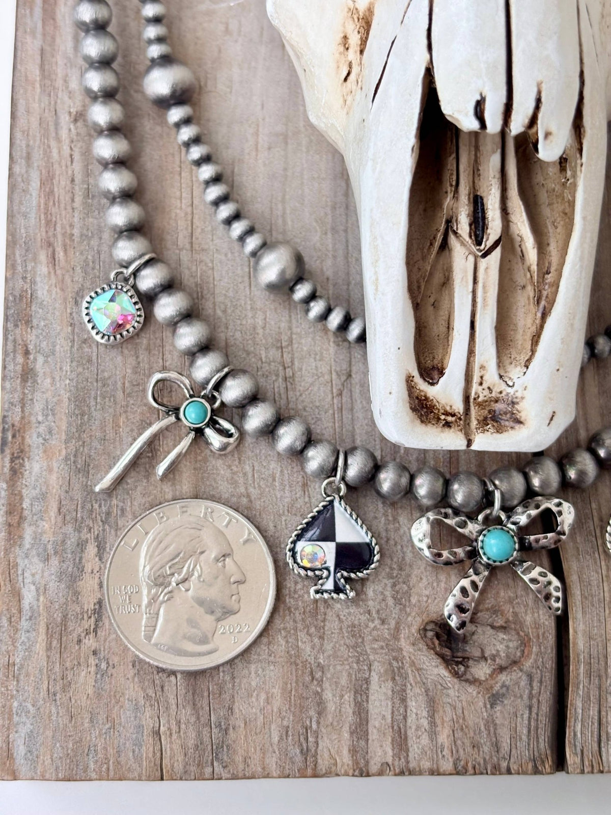 Layered Pearl Necklace with Bow & Spade Charms - Bella Blossom Boutique
