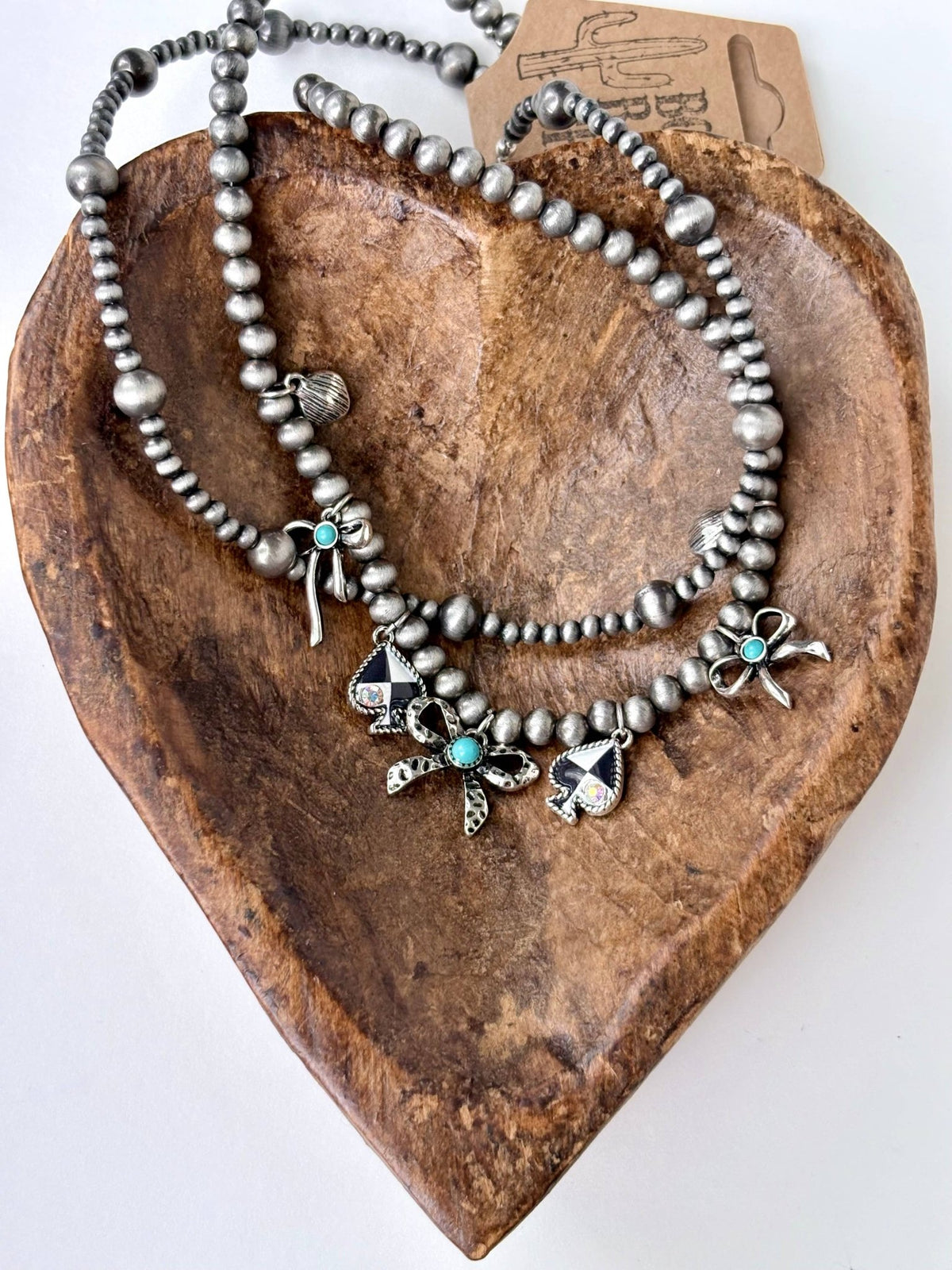 Layered Pearl Necklace with Bow & Spade Charms - Bella Blossom Boutique