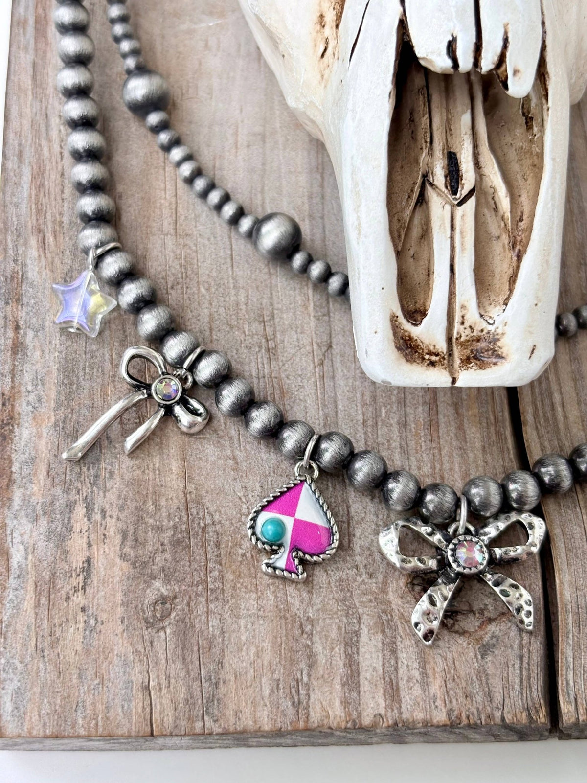 Layered Pearl Necklace with Bow & Spade Charms - Bella Blossom Boutique