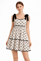 Luna Bow Print Babydoll Mini Dress with Ribbon Straps - Bella Blossom Boutique