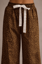 Wild Heart Leopard Ruffle Hem Wide-Leg Pants - Bella Blossom Boutique